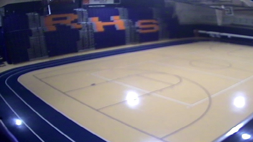 An Illinois school gym security camera footage show before the camera upgrade
