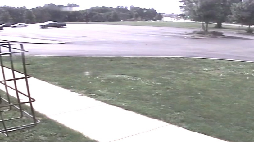 Image of parking lot and sidewalk before camera upgrade