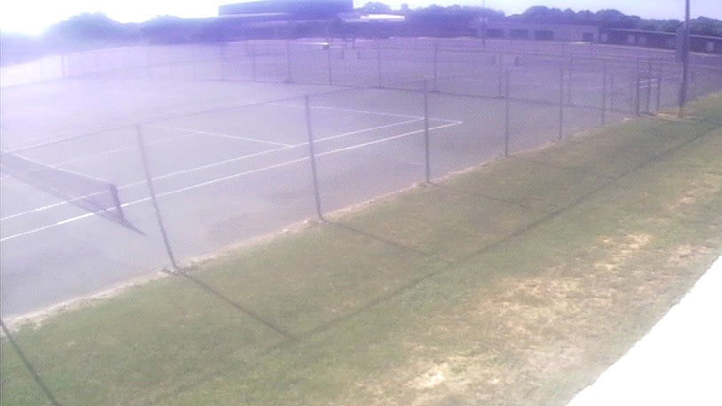 A poor image of a tennis court before cameras were upgraded to HD