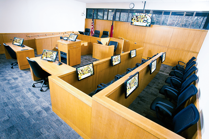 Monitors for the jury in a courtroom