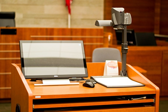 Attorney table monitors in a courtroom