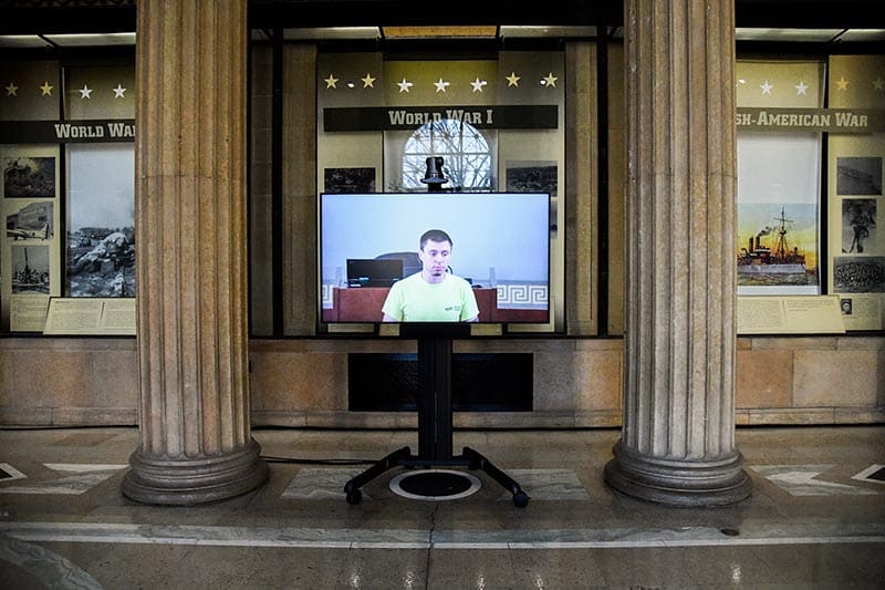 The Thompson Electronics technician is testing video from the courtroom to the public lobby